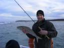 Chris with an Australian Salmon caught while Fly Fishing
